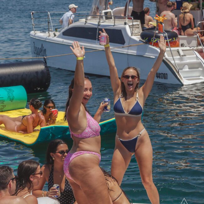 A group of women in garments on a boat.